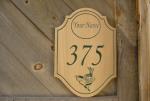 carved house plaque sample